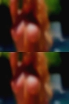 Naked woman dusting herself