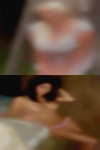 Naked woman dusting herself